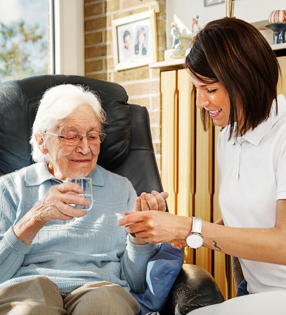 older woman and nurse assisted living image