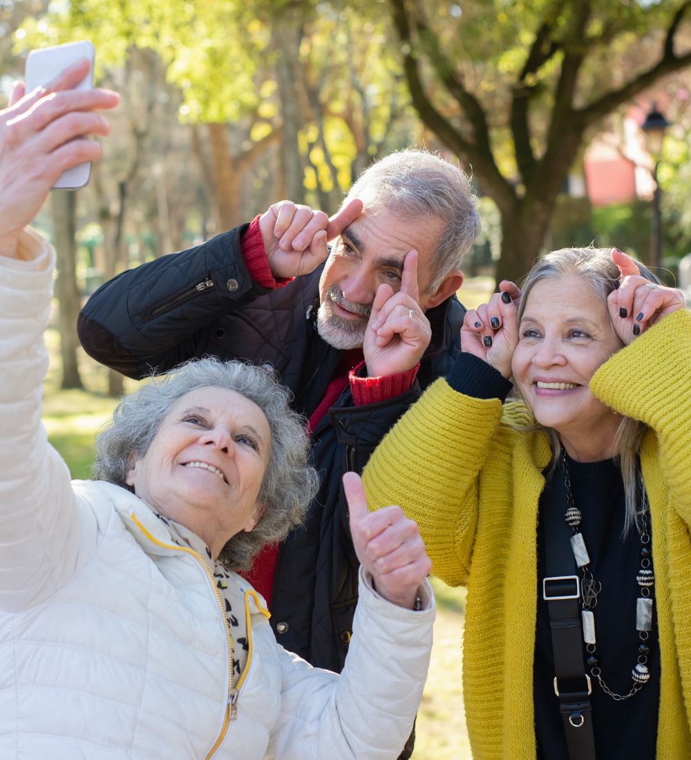 taking a group selfie at assisted living image